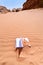 Office note book in red sand of desert