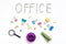 Office object. The word office, faded on a white background with metal stationery clips. The concept of office work