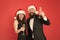 Office party. Couple at corporate party. Happy new year. Bearded businessman in tuxedo and girl elegant dress drinking