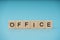 Office text of wooden letters on tranquil background