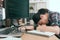 Office worker overworked and sleeping on desk