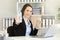 Office worker showing a bottle of water