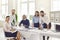 Office workers gathered in the conference hall to conduct research and implement new ideas.