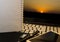 Office workplace with notebook, smart phone, pen, flash drive and wordpad with sunset