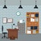 Office workspace desk armchair furniture books cabinet diploma clock wall brick