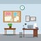 Office workspace desk table potted plant clock notice board trash can laptop