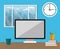 Office workspace laptop cup utensil clock window