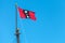 The official Amsterdam flag on top of the mast of a sailship