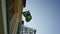 Official Federative Republic Brazil national flag waving by wind at building