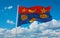 official flag of Drapeau ville ca Longueuil Quebec Canada at cloudy sky background on sunset, panoramic view. Canadian travel and