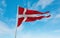 official flag of Naval Rank Vice Admiral 1880, Denmark at cloudy sky background on sunset, panoramic view. Danish travel and