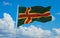 official flag of Nordic cross proposal lithuania at cloudy sky background on sunset, panoramic view. lithuanian travel and patriot