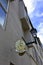 Official french notary sign fixed on the facade of a notaries office building, France