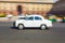 Official Hindustan Ambassador car driving outside North Block, S