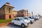 Official Hindustan Ambassador cars park outside North Block, Secretariat Building in Delhi, India
