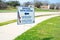 Official Vote Center yard sign with stake in English, Spanish, Vietnamese languages to welcome resident and non-English-proficient