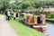 Officials check narrowboats in preparation for transiting the Stanedge tunnel on the Huddersfield Narrow Canal, Diggle, Oldham,