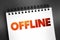 Offline - means that the device and its user are disconnected from the global internet, text on notepad, concept background