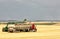 Offloading freshly harvested wheat into a truck.