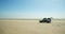 Offroad driving, SUV is driving on high speed across the desert in Namibia