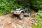 Offroad suv jeep climbing a rocky section, Svaneti, Georgia