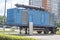 Offshore container trailer with powerful electric generator.