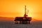 Offshore oil platform at dusk