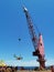 Offshore pedestal crane doing lifting activities onboard offshore accommodation barge