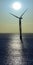 Offshore wind turbine at sunrise
