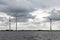 Offshore windfarm near Dutch coast with cloudy sky