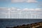 Offshore Windmill farm in the ocean Westermeerwind park , windmills isolated at sea on a beautiful bright day