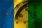 Ogoni people flag with clock close to midnight in the background. Happy New Year concept