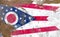 Ohio  damaged, scratch, old style state flag on wall