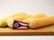 Ohio flag on a wooden panel with corn isolated on a white backgr