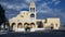 OIA, GREECE-SEPTEMBER, 9, 2016: exterior view of the front of the church of st george in oia on the island of santorini