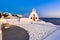 Oia town, Santorini island, Greece at sunset. Traditional and fa