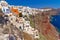 Oia town on volcanic cliff of Santorini island