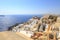 Oia village cityscape of windmill and castillo in Santorini island