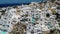 Oia village Santorini with whitewashed house and swimming pools Santorini Greece Europe