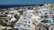 Oia village Santorini with whitewashed house and swimming pools Santorini Greece Europe