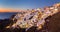 Oia village at sunset, Santorini island, Greece.