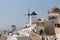 Oia village with windmill in greek island