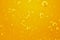 Oil background. Golden liquid with air bubbles on white background  for projects, oil, honey, beer, juice, shampoos