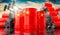 Oil barrels with flag of China and oil extraction wells - 3D illustration