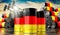 Oil barrels with flag of Germany and oil extraction wells - 3D illustration