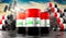 Oil barrels with flag of Iraq and oil extraction wells - 3D illustration