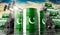 Oil barrels with flag of Pakistan and oil extraction wells - 3D illustration