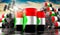 Oil barrels with flag of Sudan and oil extraction wells - 3D illustration