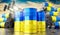 Oil barrels with flag of Ukraine and oil extraction wells - 3D illustration