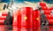 Oil barrels with flag of Vietnam and oil extraction wells - 3D illustration